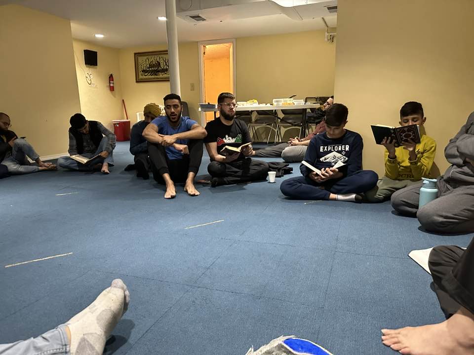 Youth and adults in a Qur’an circle at the Islamic Center of Louisville